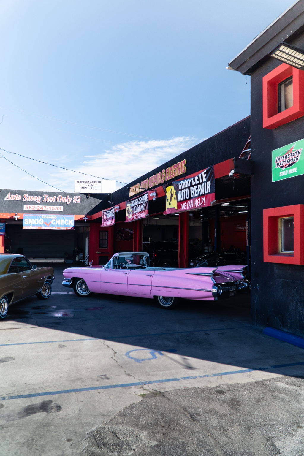 Alex Jr's Auto Repair & Electric shop exterior with classic vehicle