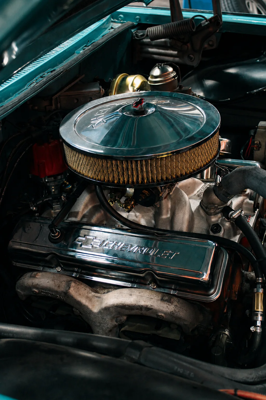 Engine components in a classic Chevrolet Impala