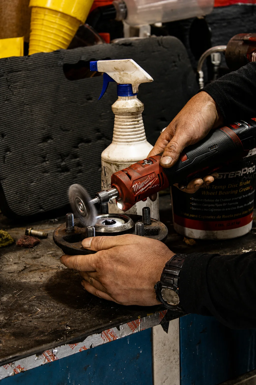 Technician preparing a wheel hub